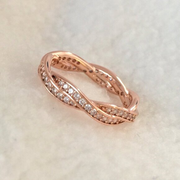 pandora Jewelry - CLEARANCE.... NWOT Pandora Rose Gold Twist of Fate Ring All Sizes